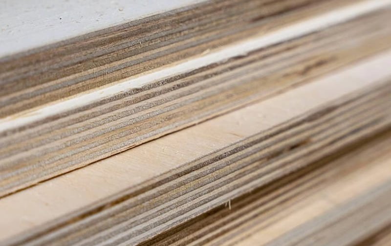 Microscopic view of MDF composition showing wood fibers bonded with resin under high pressure