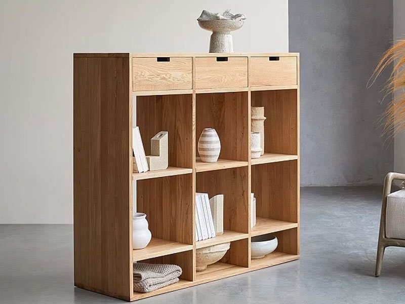 Modern plywood furniture set with minimalist chairs and table in a bright living space.