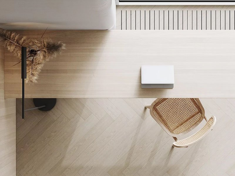 Plywood sheets treated with moisture prevention techniques to resist water damage in construction.