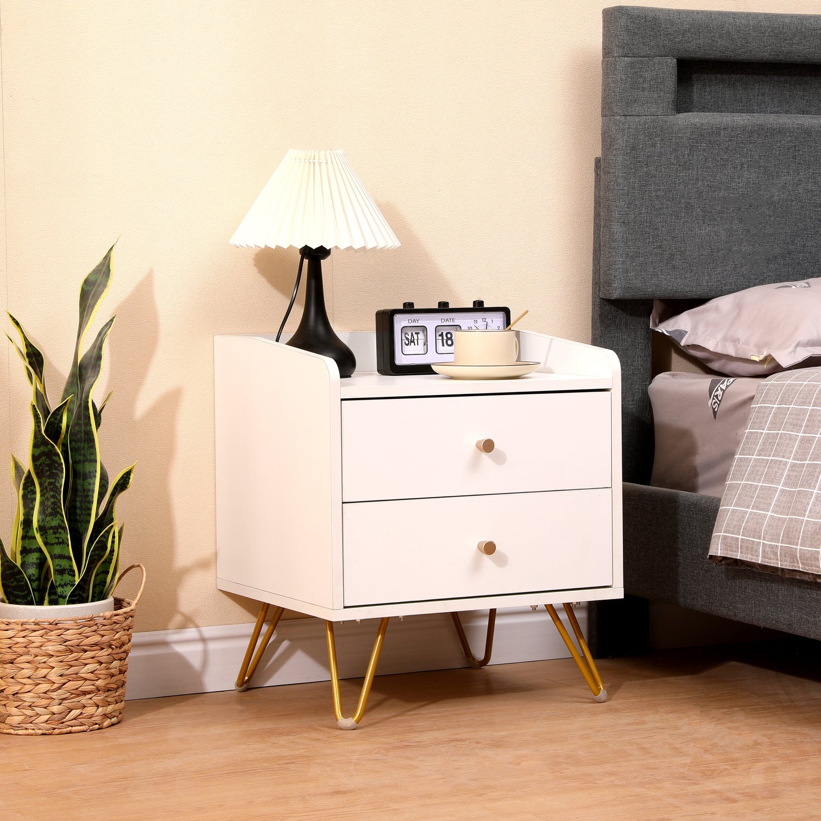 Modern metal nightstand with sleek frame and storage drawer, ideal for contemporary bedrooms.